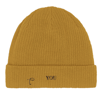 Close-up van mosterd gele beanie met ribstructuur van Lettre